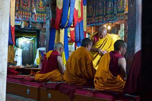 Money get distributed to monks during ceremony