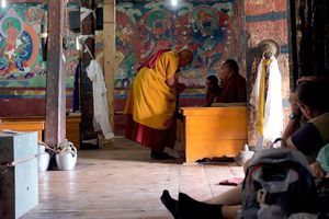 Money get distributed to monks during ceremony