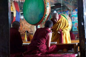 Money get distributed to monks during ceremony